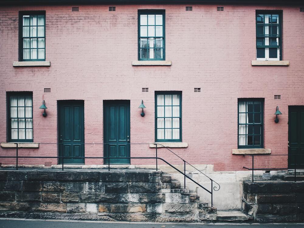 photo of dual key apartment building with stairs