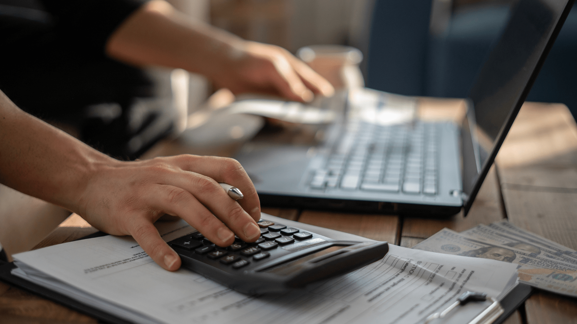 Image of Man Calculating LMI Costs and Savings