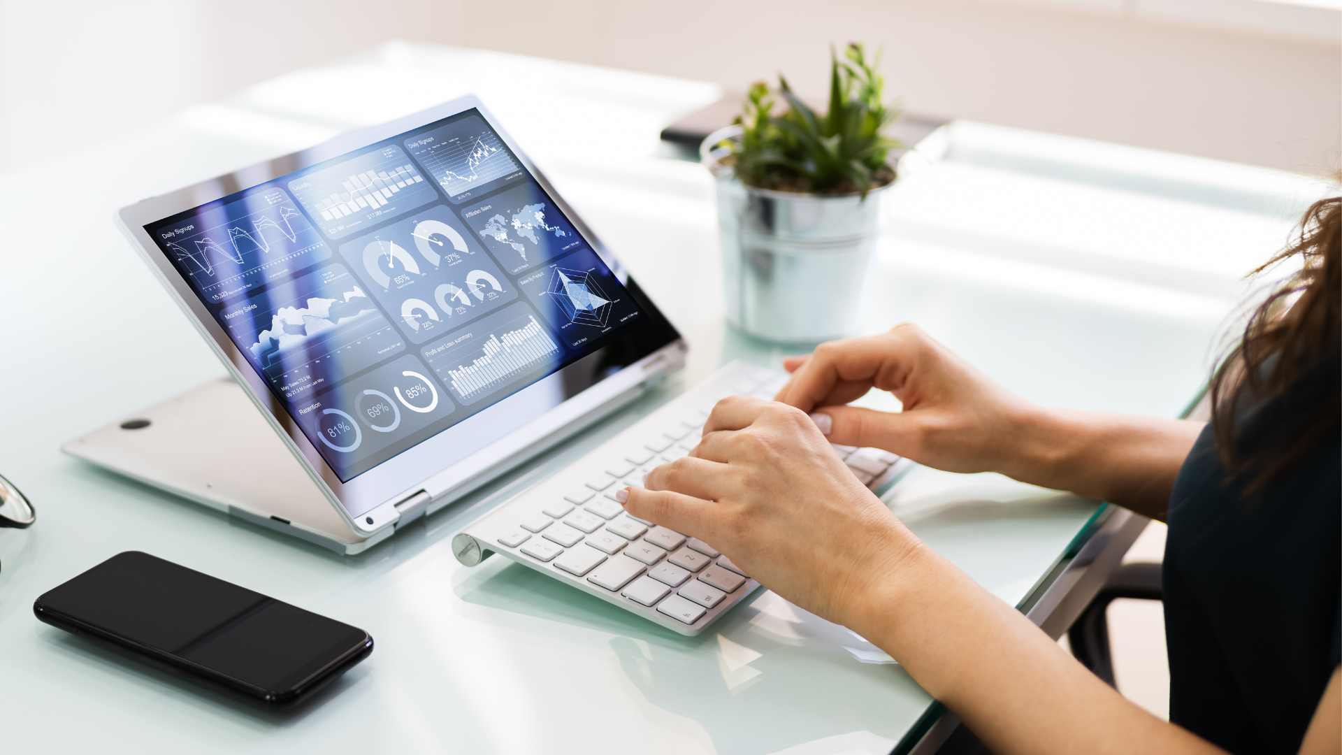 Cracking the Code Real Estate Investments Image 3 - Woman looking at data on her computer