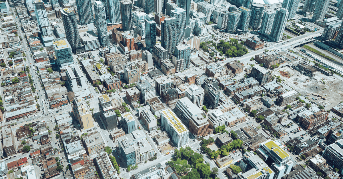 Property Portfolio - Landscape view of a city showing a lot of real estate commercial and residentials buildings