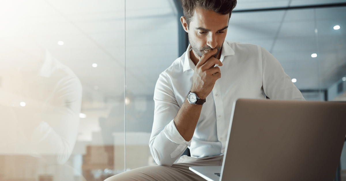 building wealth through investment property - image of a person searching for alternative real estate investment by looking at his laptop