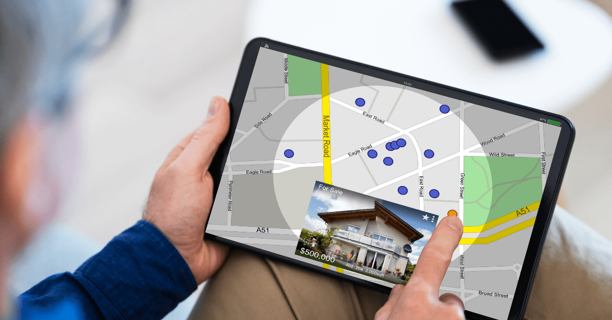 how to start with small investment property to build wealth - image of a person holding a tab showing a property location and picture of the property