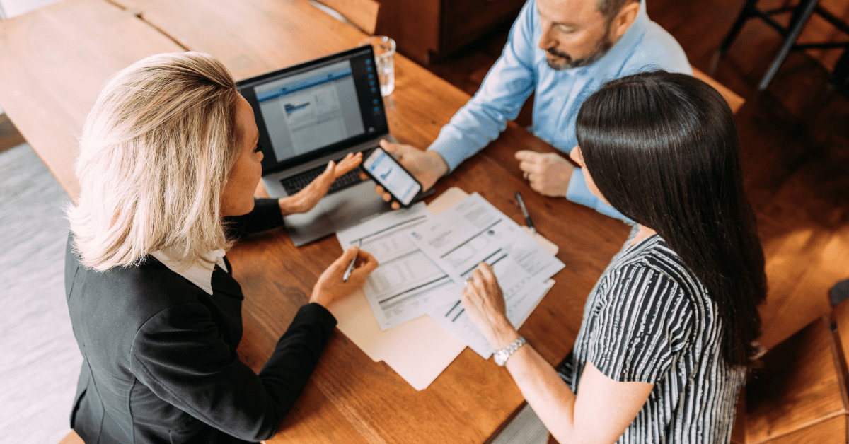 A professional advisor is advising a couple about rentvesting and property investment strategy in 2024