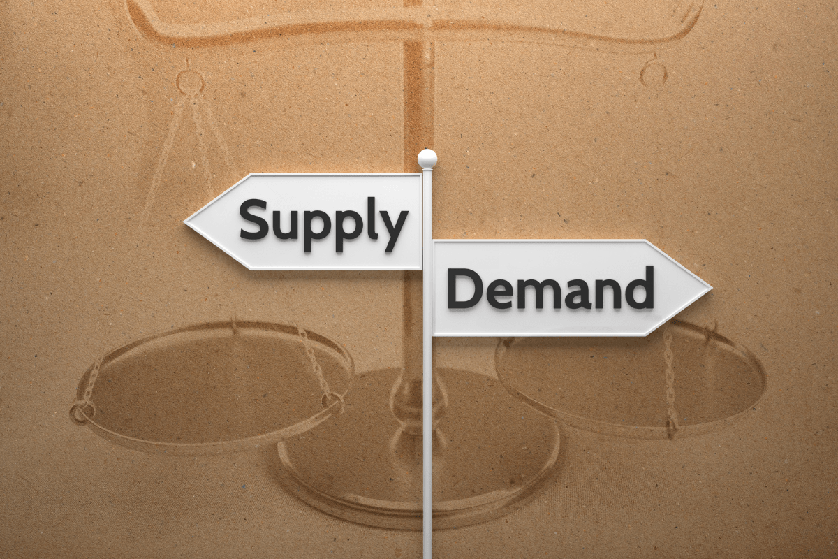 a direction stand with having supply and demand in it