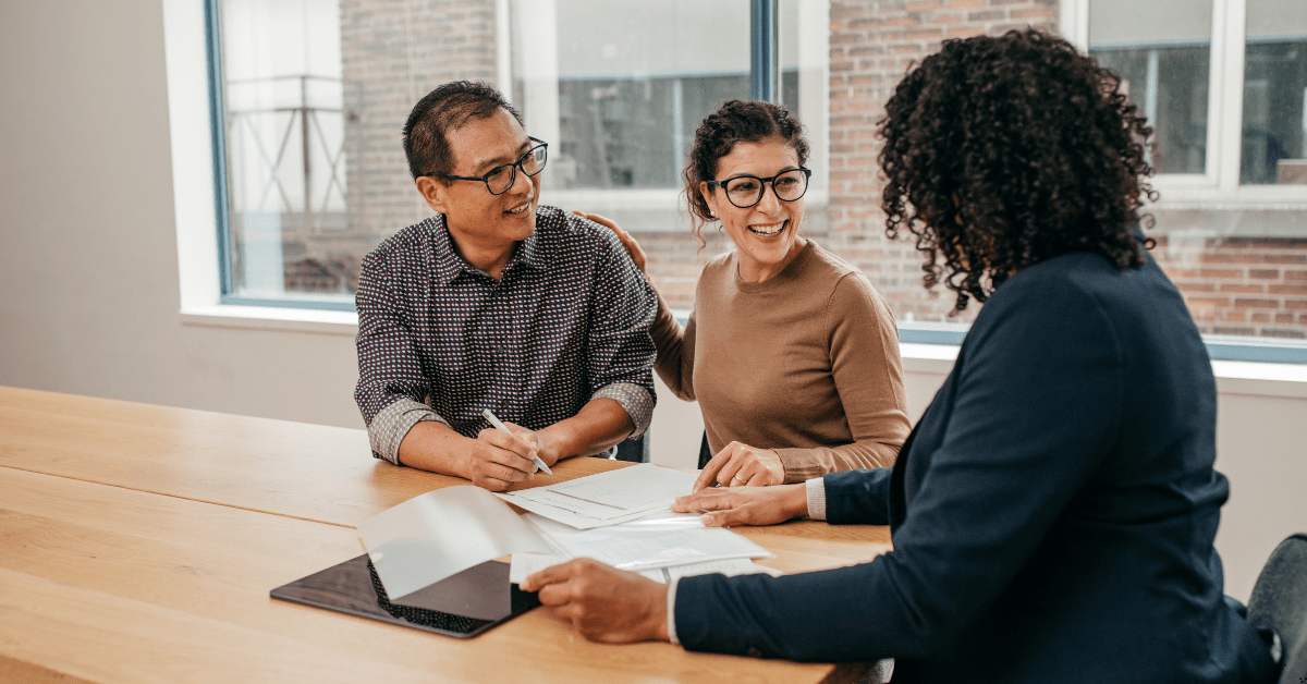 Investment Property - Image of a couple discussing investment property option with a professional