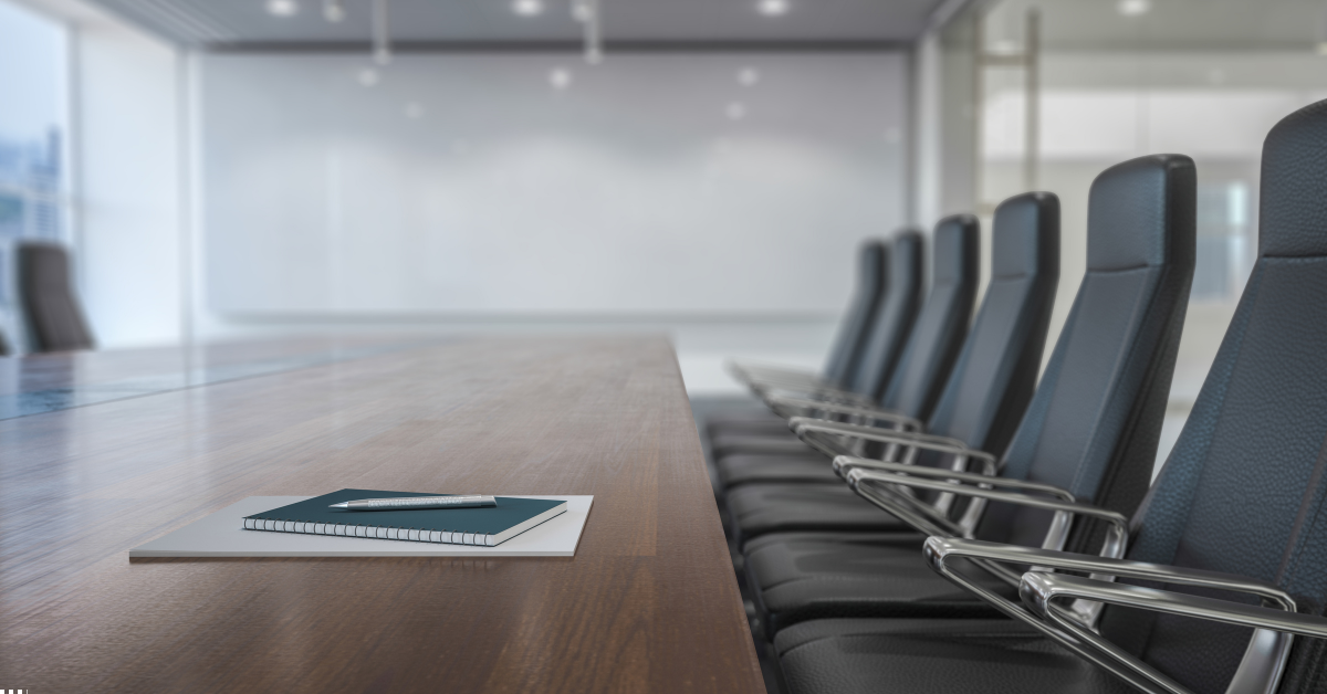 SMSF Trustee - Image of a board meeting table and chairs also a diary of pen