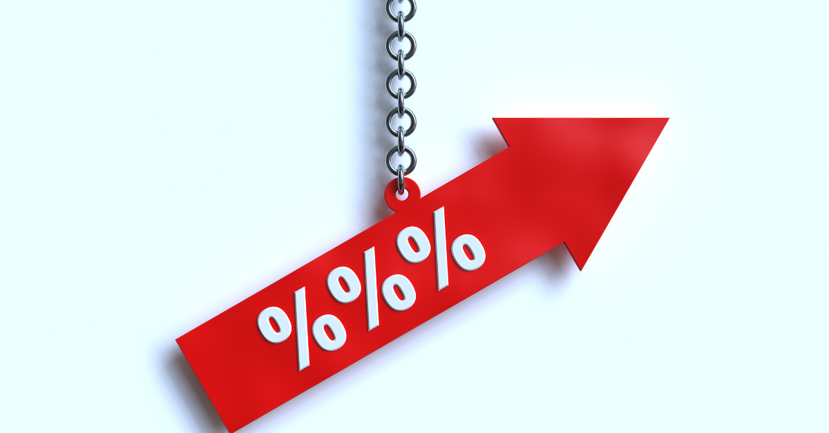 Red arrow symbolizing rising interest rates with percentage signs, representing economic shifts in the real estate market.
